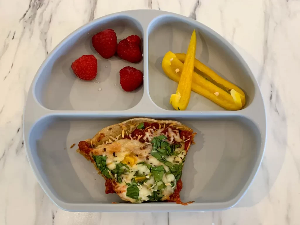 easy lunch idea for 1 year old: raspberries, pepper sticks, pizza
